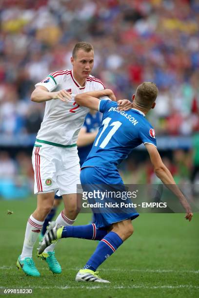 Iceland's Alfred Finnbogason is brought down by Hungary's Adam Lang late in the game