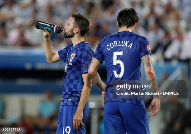 Croatia's Milan Badelj and Croatia's Vedran Corluka