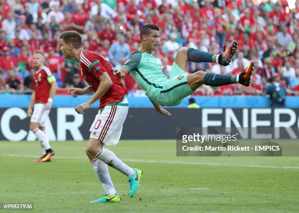 Hungary's Richard Guzmics and Portugal's Cristiano Ronaldo