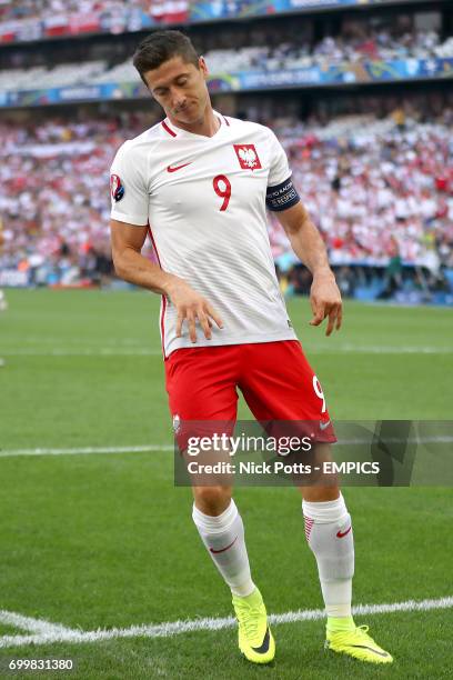 Poland's Robert Lewandowski shows his dejection during the game