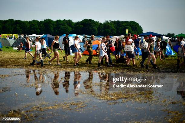 Festival goers arrive at the camp during the Hurricane Festival 2017 on June 22, 2017 in Scheessel, Germany. 75.000 visitors are expected until...