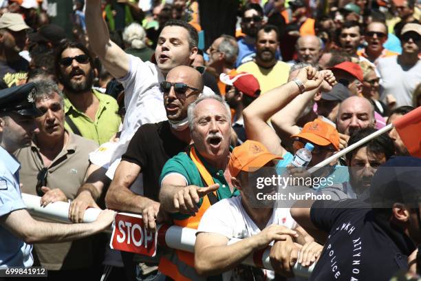 Municipal workers demonstrate at the Greek Parliament during a protest march organized by the Federation of workers in municipalities in Athens on...