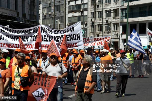 Municipal workers march in central Athens on June 22, 2017. The Federation of workers in municipalities is holding a 24-hour strike and organized a...