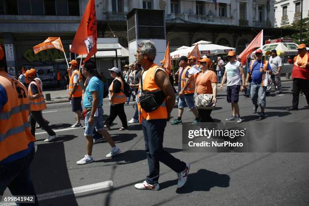 Municipal workers march in central Athens on June 22, 2017. The Federation of workers in municipalities is holding a 24-hour strike and organized a...