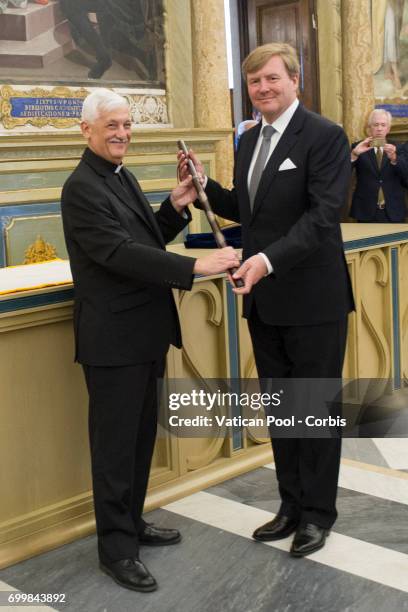 King Willem-Alexander of the Netherlands receives the scepter of the Dutch power from the Superior General of The Society of Jesus father Arturo Sosa...