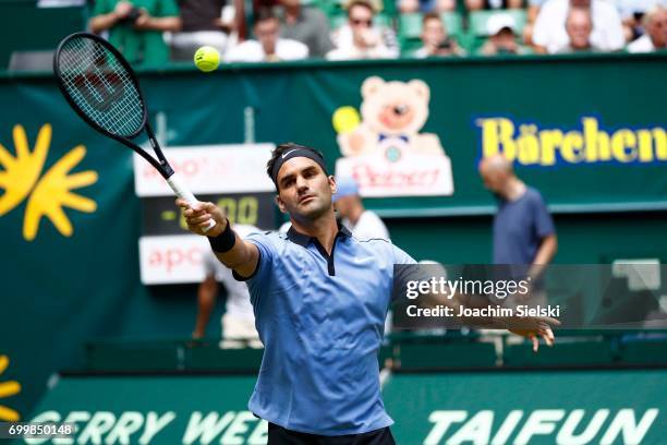 Roger Federer of Switzerland returns the ball during the men's singles match against Mischa Zverev of Germany on Day 6 of the Gerry Weber Open 2017...