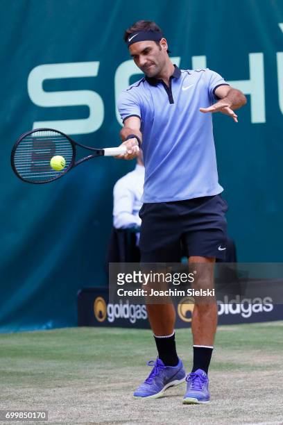 Roger Federer of Switzerland returns the ball during the men's singles match against Mischa Zverev of Germany on Day 6 of the Gerry Weber Open 2017...