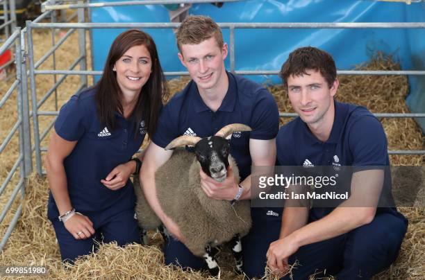 Eve Muirhead and brothers Thomas Muirhead and Glen Muirhead pose for photographs at The Royal Highland show after being amongst the first athletes...