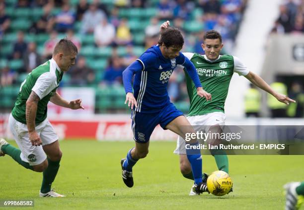 Hibernian's Scott Martin, Alex Harris and Birmingham City's Deigo Fabrini.