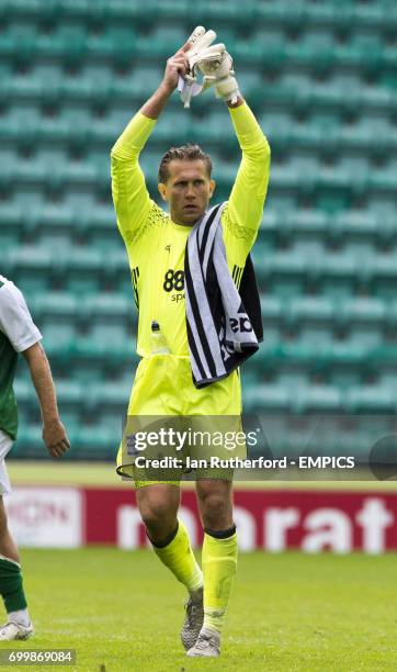 Birmingham City goalkeeper Tomasz Kuszczak applauds the travelling support