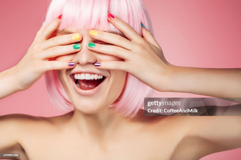 Beautiful woman wearing birthday cap