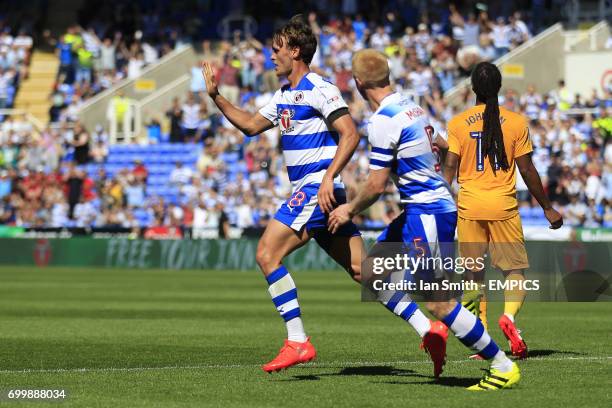 Reading's John Swift celebrates scoring his side's first goal with Paul McShane