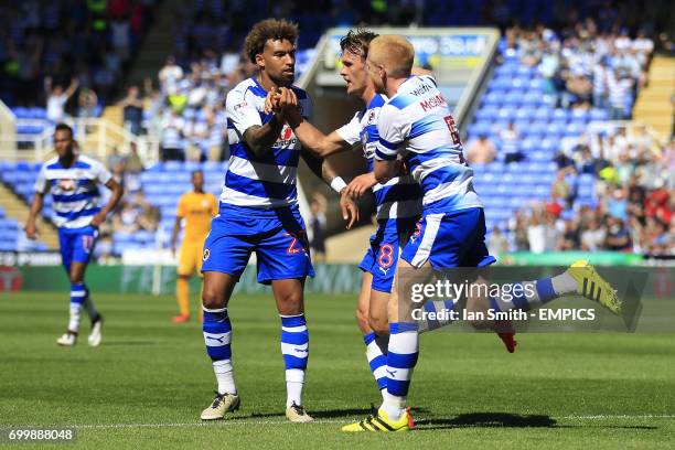 Reading's John Swift celebrates scoring his side's first goal with Daniel Williams and Paul McShane