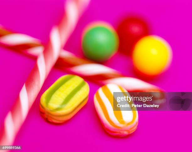 multi coloured sweets candy - sugar rush stock pictures, royalty-free photos & images