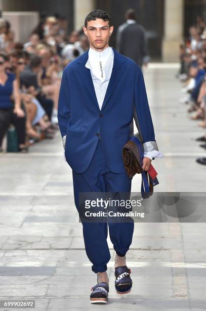 Model walks the runway at the Louis Vuitton Spring Summer 2018 fashion show during Paris Menswear Fashion Week on June 22, 2017 in Paris, France.
