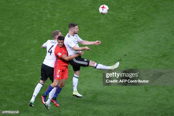 Chile's forward Alexis Sanchez vies with Germany's defender Shkodran Mustafi and Germany's defender Matthias Ginter during the 2017 Confederations...