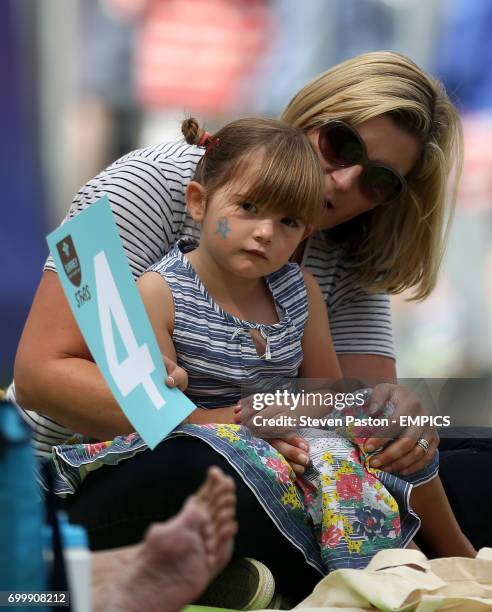 Young Surrey supporter enjoys the game