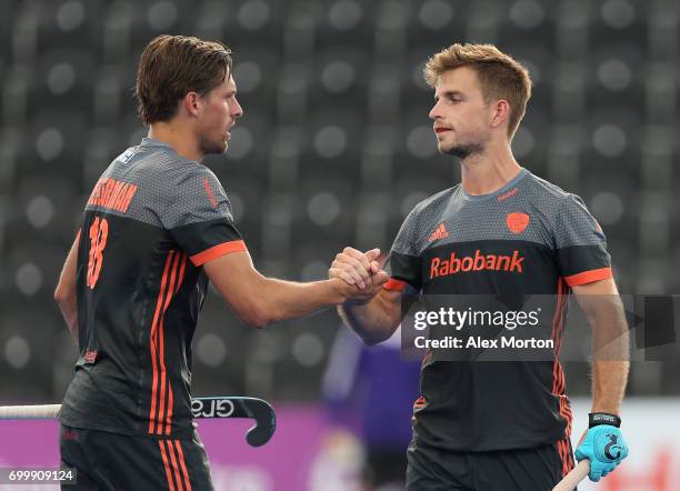 Tristan Algera of the Netherlands celebrates scoring his teams sixth goal with teammate Bjorn Kellerman during the quarter final match between the...