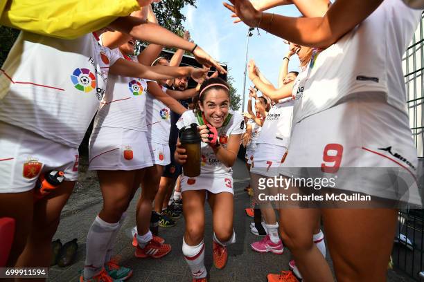 Spain's most capped player Rocio Ybarra of Spain receives a guard of honour to mark her 250th cap following the FINTRO Women's Hockey World League...