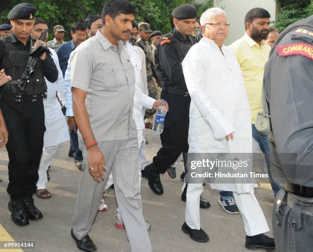 President Lalu Prasad proceeding to appear before a special CBI Court in connection with a Fodder Scam case at court premises on June 22, 2017 in...