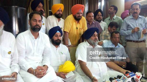 Sukhbir Singh Badal interacting with media along with Bikram Singh Majithia, who is holding turban of AAP MLA which later handed over to him at GMCH...