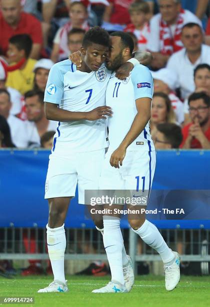 Demarai Gray of England celebrates scoring his sides first goal with Nathan Redmond of England during the UEFA European Under-21 Championship Group A...