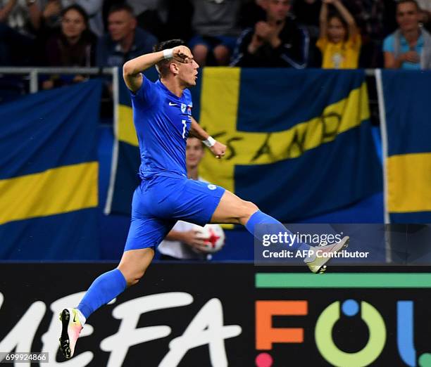 Slovakia's midfielder Jaroslav Mihalik celebrate scoring during the UEFA U-21 European Championship roup A football match Slovakia v Sweden in...