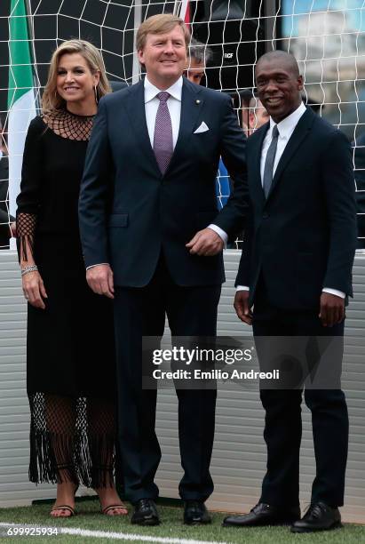 King Willem-Alexander of the Netherlands Queen Maxima of the Netherlands and Clarence Seedorf attend a football clinic for integration organized by...