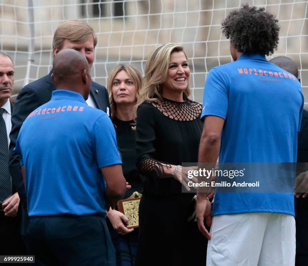 King Willem-Alexander of the Netherlands and Queen Maxima of the Netherlands attend a football clinic for integration organized by Italian Football...