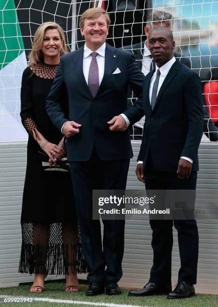 King Willem-Alexander of the Netherlands Queen Maxima of the Netherlands and Clarence Seedorf attend a football clinic for integration organized by...