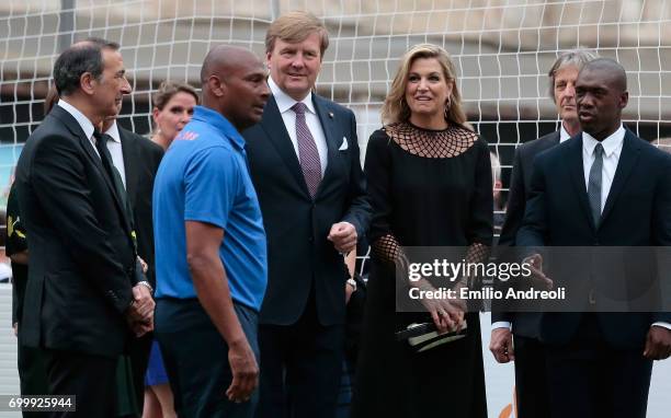 King Willem-Alexander of the Netherlands and Queen Maxima of the Netherlands attend a football clinic for integration organized by Italian Football...