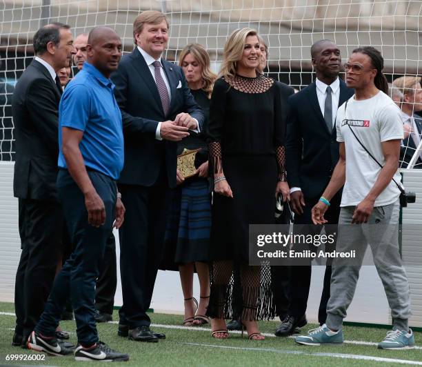 King Willem-Alexander of the Netherlands and Queen Maxima of the Netherlands attend a football clinic for integration organized by Italian Football...