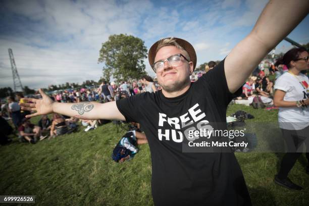People gather in front of the Pyramid Stage at the Glastonbury Festival site at Worthy Farm in Pilton on June 22, 2017 near Glastonbury, England. The...