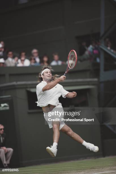 American tennis player Andre Agassi pictured in action competing to progress to reach the quarterfinals of the Men's Singles tournament at the...