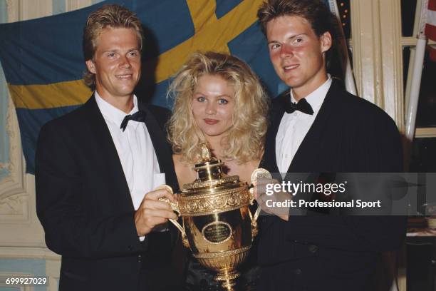 Swedish tennis player Stefan Edberg , men's champion at the 1990 Wimbledon Championships, pictured wearing formal evening wear with his girlfriend...