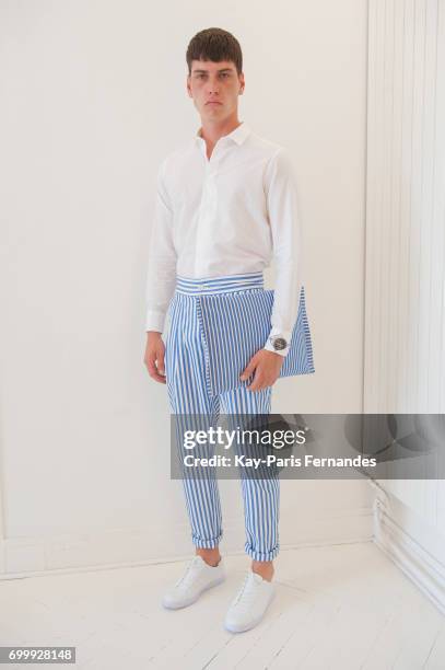 Model poses during the Essius Presentation - Menswear Spring/Summer 2018 show as part of Paris Fashion Week on June 22, 2017 in Paris, France.