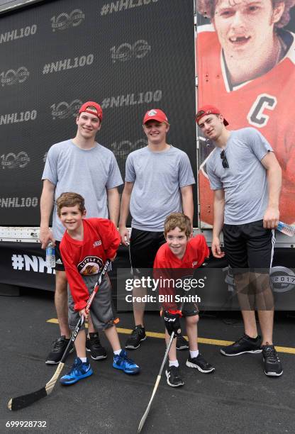 Top draft prospects Nolan Patrick, Casey Mittelstadt and Gabriel Vilardi pose with young hockey players during the Top Prospects Hockey Clinic at the...