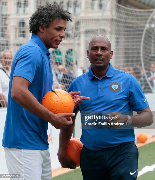 Aron Winter and Pierre van Hooijdonk attend a football clinic for integration organized by Italian Football Federation on June 22, 2017 in Milan,...