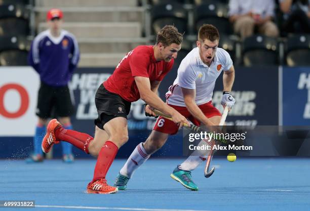 Mark Pearson of Canada and Henry Weir of England battle for possesion during the quarter final match between England and Canada on day seven of the...