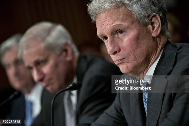 Mark McWatters, acting chairman of the National Credit Union Administration, listens during a Senate Banking Committee hearing in Washington, D.C.,...
