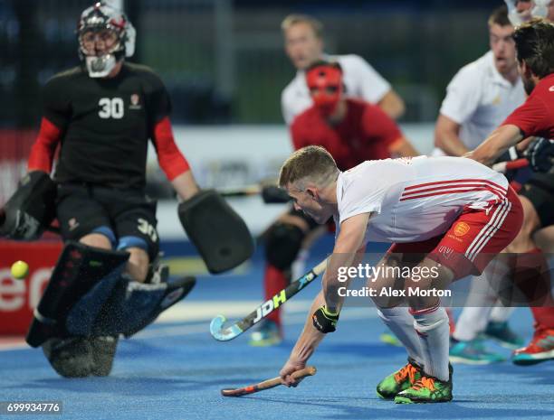 Sam Ward of England scores his teams fourth goal during the quarter final match between England and Canada on day seven of the Hero Hockey World...