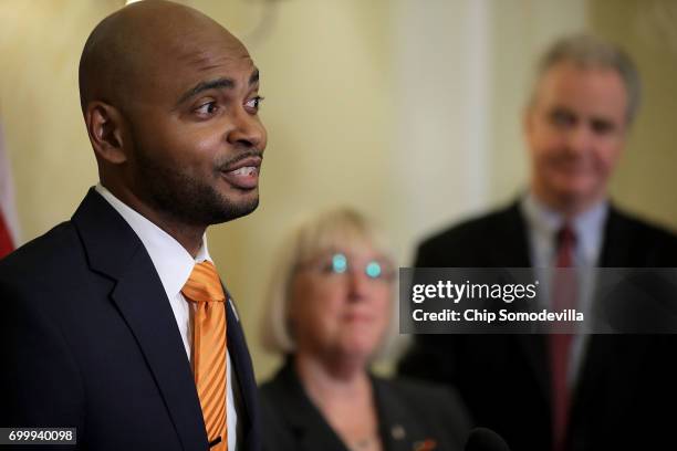 Marques Jones of Richmond, Virginia, who has multipule sclerosis, speaks during a news conference with U.S. Sens. Patty Murray and Chris Van Hollen...