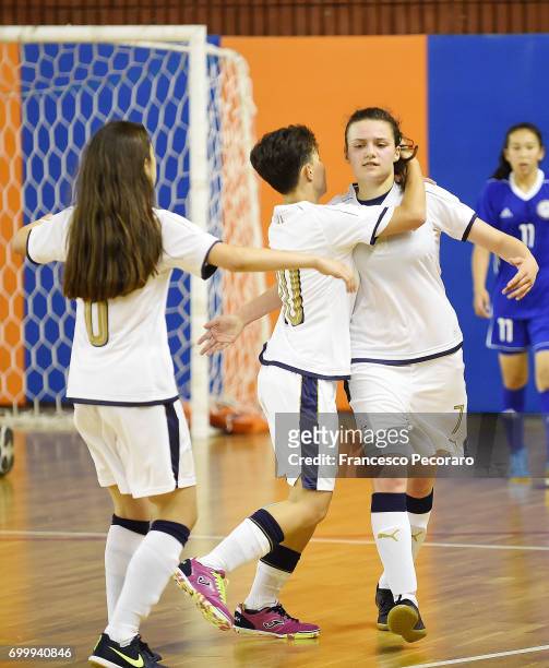 Lisa Molon and Sabrina Scommegna of Italy celebrate after Lisa Molon scored the 4-1 goal during the U17 Women Futsal Tournament match between Italy...