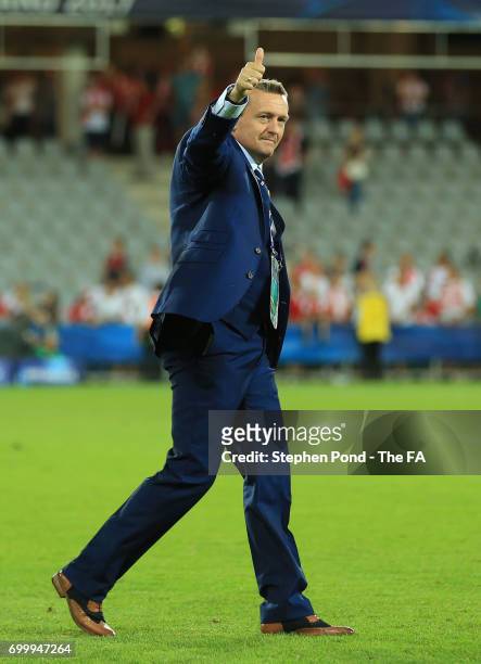 Adrian Boothroyd, coach of England shows appreciation to the fans after the UEFA European Under-21 Championship Group A match between England and...