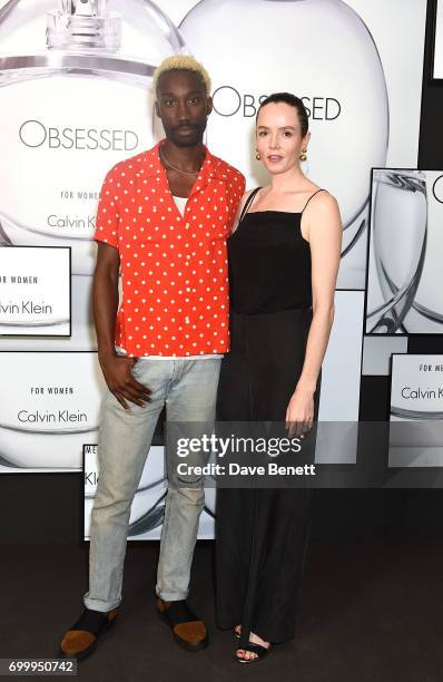 Nathan Stewart Jarrett and guest attend the Kate Moss & Mario Sorrenti launch of the OBSESSED Calvin Klein fragrance launch at Spencer House on June...