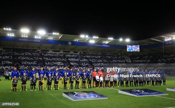 Leicester City playes and FC Porto players line up for the Champions League anthem before kick off