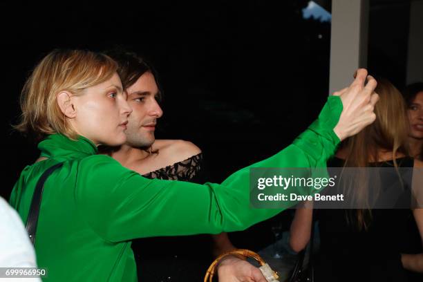 Guinevere Van Seenus and guest take a selfe at Kate Moss & Mario Sorrenti launch of the OBSESSED Calvin Klein fragrance at Spencer House on June 22,...