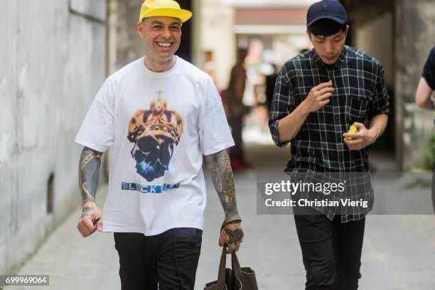 Guests outside Boris Bidjan Saberi during Paris Fashion Week - Menswear Spring/Summer 2018 on June 22, 2017 in Paris, France.