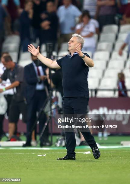 Astra Giurgiu manager Marius Sumudica celebrates after the final whistle