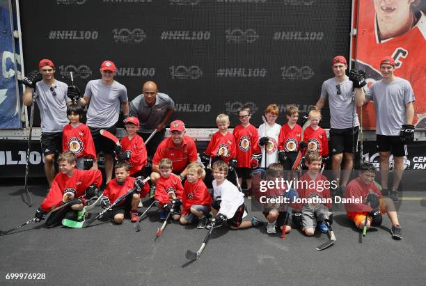 Nico Hischier, Casey Mittelstadt, Jamal Mayers; Denis Savard, Gabriel Vilardi and Nolan Patrick pose with children after the 2017 NHL Draft top...